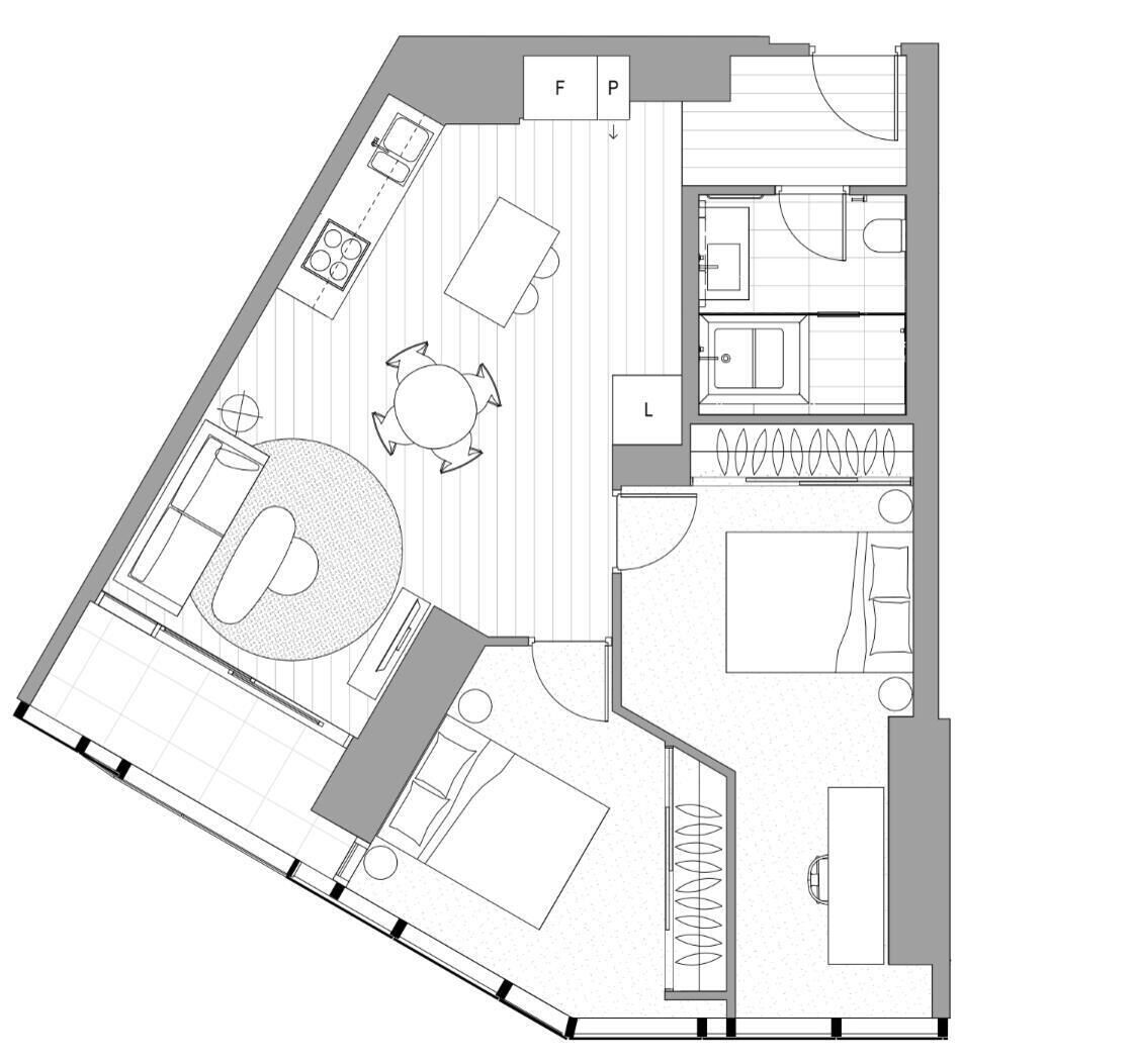A floor plan with a kitchen, dining area, living room, and a bathroom.
