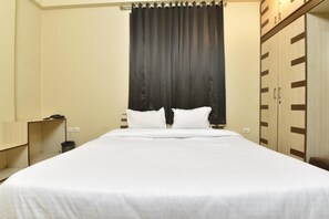 Habitación Deluxe doble, vistas a la ciudad | Cortinas opacas y sistema de insonorización