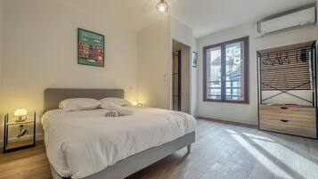 2 habitaciones, tabla de planchar con plancha, wifi y ropa de cama