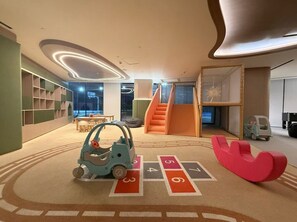 Children’s area - Bright 1BR Apartment Stay with Mini Pool, Near Community Parks - Binghatti Royale, Jumeirah Village Circle (Dubai)