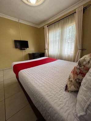 Family Cottage, Kitchen, Garden View | Iron/ironing board, free WiFi - The Village Cottages (Harare)