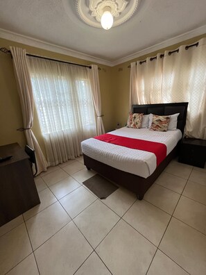 Family Cottage, Kitchen, Garden View | Iron/ironing board, free WiFi - The Village Cottages (Harare)