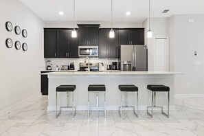 Fridge, microwave, oven, stovetop - Four Bedrooms w  Pool Townhome 4841 (Kissimmee)