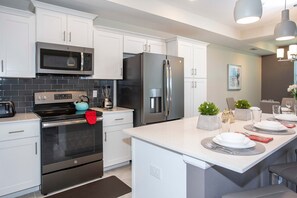 Fridge, microwave, oven, stovetop - Gorgeous Two Bedroom Apt Close to Disney 306 4721  Storey Lake Resort (Kissimmee)