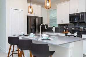 Fridge, microwave, oven, stovetop - Gorgeous 5Bd Single Family w  Pool   Storey Lake 2767O (Kissimmee)