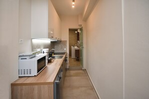 Suite estándar, vista al mar | Cocina privada