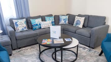 Apartamento, 2 quartos | Área de estar