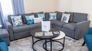 Apartamento, 2 quartos | Área de estar