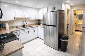 Apartment, 2 Bedrooms | Private kitchen | Fridge, oven, coffee/tea maker, toaster - Direct Bayfront Sunsets - Boat Docks - Pool - Fish 2 Bedroom Apts (South Padre Island)