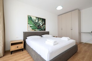 Desk, iron/ironing board, travel crib, WiFi (free)
