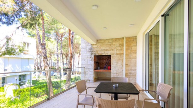 Outdoor dining - SanPietro Vacation Apartment 042 (Plazhi San Pietro)