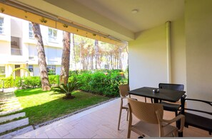 Outdoor dining - SanPietro Vacation Apartment 044 (Plazhi San Pietro)