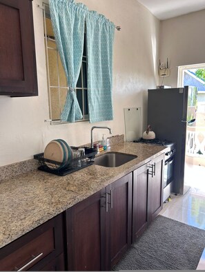 Fridge, oven, stovetop, cookware/dishes/utensils - Adorable 1BR Cottage Walk to the Beach Priory (Priory)