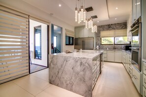Cookware/dishes/utensils - Luxury Oceanfront Villa~ Fully Staffed~Pool~Jacuzzi~Movie Theatre (Tower Isle)