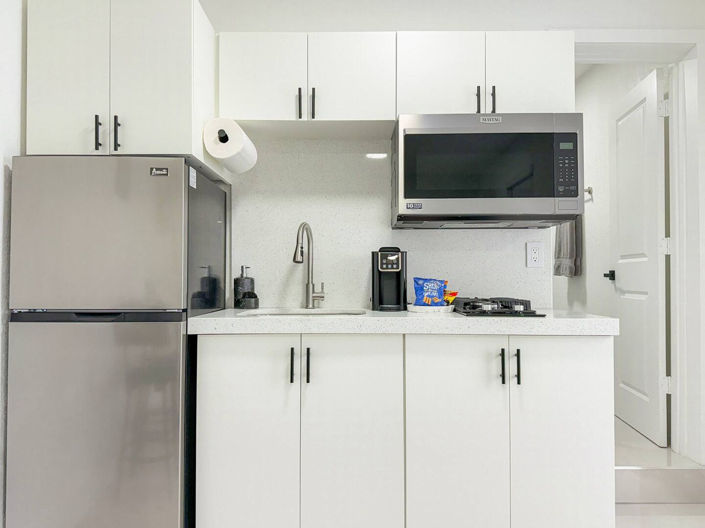 Fridge, microwave, coffee/tea maker, toaster