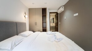 2 habitaciones, tabla de planchar con plancha y ropa de cama 
