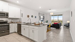 Fridge, microwave, oven, stovetop - Stylish 3BR Condo @ ChampionsGate w/ Water Park (Davenport)