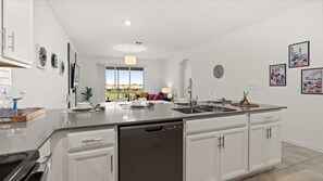 Fridge, microwave, oven, stovetop - Stylish 3BR Condo @ ChampionsGate w/ Water Park (Davenport)