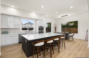 Fridge, microwave, oven, stovetop - Brand New 5BR Home | Fenced Yard + Ample Parking (Kent)