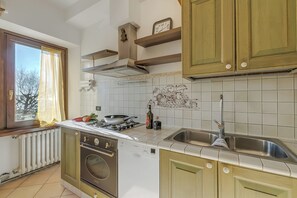 Family Apartment, Multiple Bedrooms, 2 Bathrooms, Mountainside (Il Borgo Del Vergante Casa Maria) | Private kitchen - Il Borgo del Vergante Apartments (Nebbiuno)