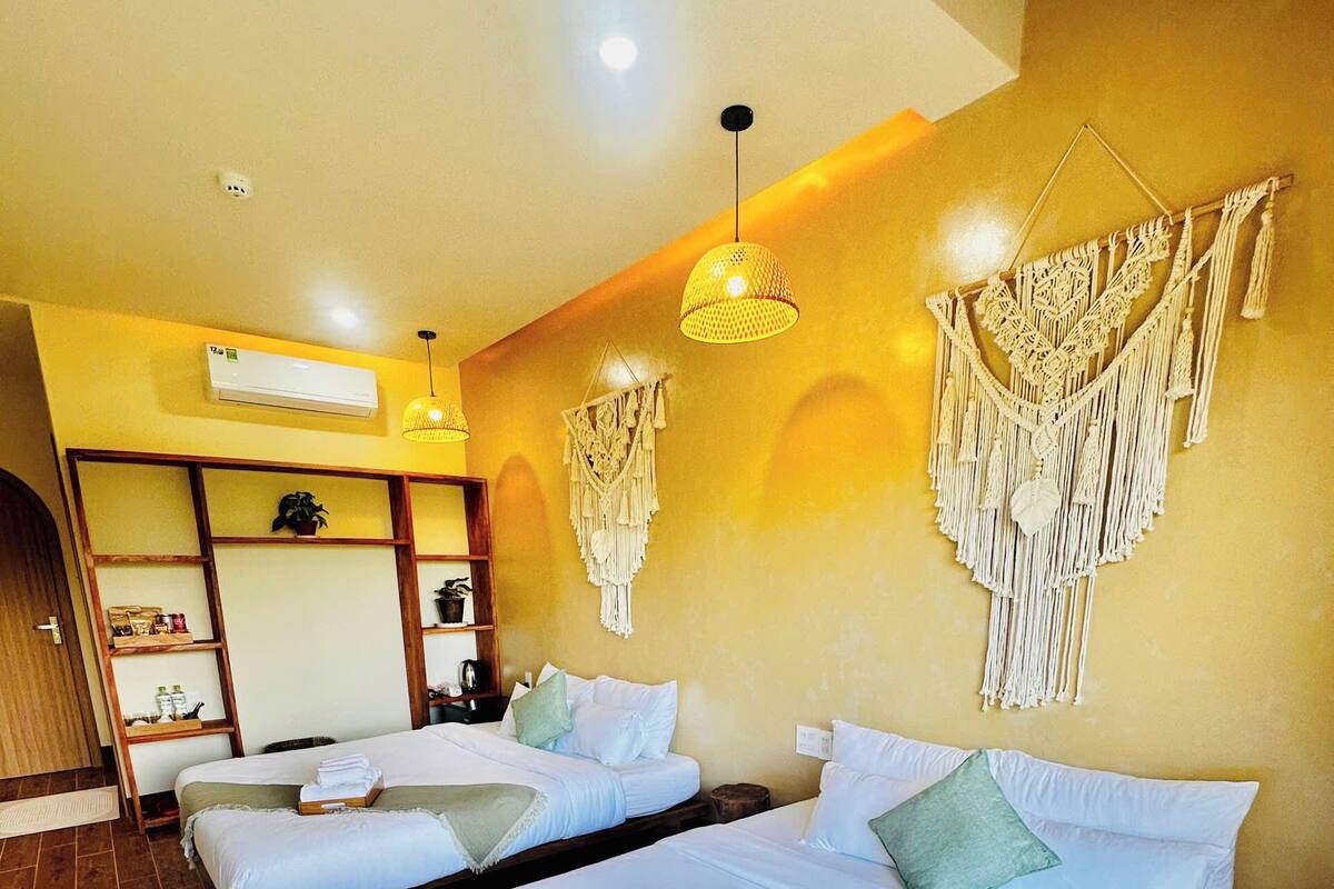 Chambre Quadruple Deluxe, plusieurs lits, balcon, vue océan