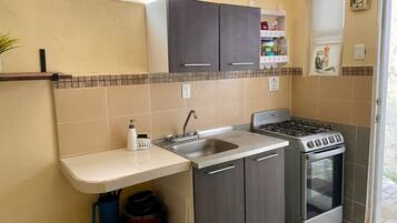 Fridge, microwave, stovetop, coffee/tea maker