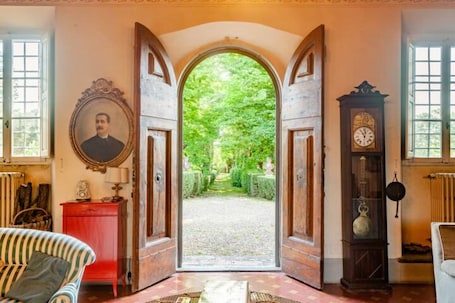 Interior. Elegant room in 15th-century villa with private bathroom and pool