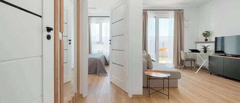 1 bedroom, desk, iron/ironing board, travel crib