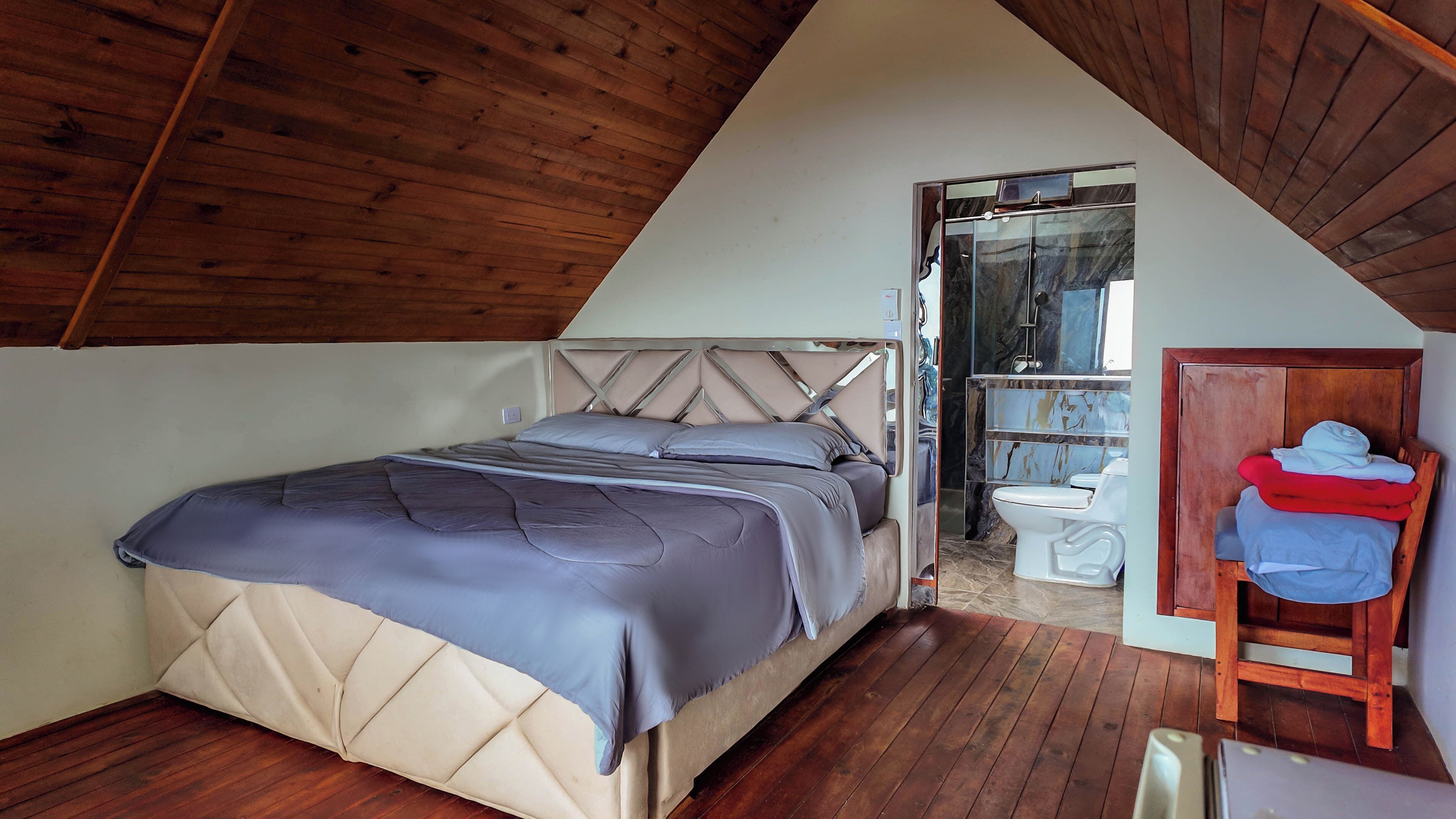 Chambre triple Deluxe | Literie fournie