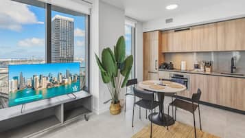 Apartment | Living area | 50-inch Smart TV with cable channels