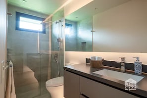 Shower, towels, soap, toilet paper