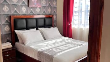 1 chambre, fer et planche à repasser, Wi-Fi, draps fournis