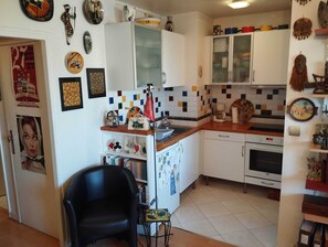 Private kitchen - In the heart of Paris, apartment with balcony-terrace! (Paris)