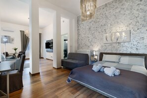 1 slaapkamer, een strijkplank/strijkijzer, beddengoed