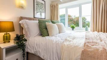 4 bedrooms, iron/ironing board, travel cot, WiFi