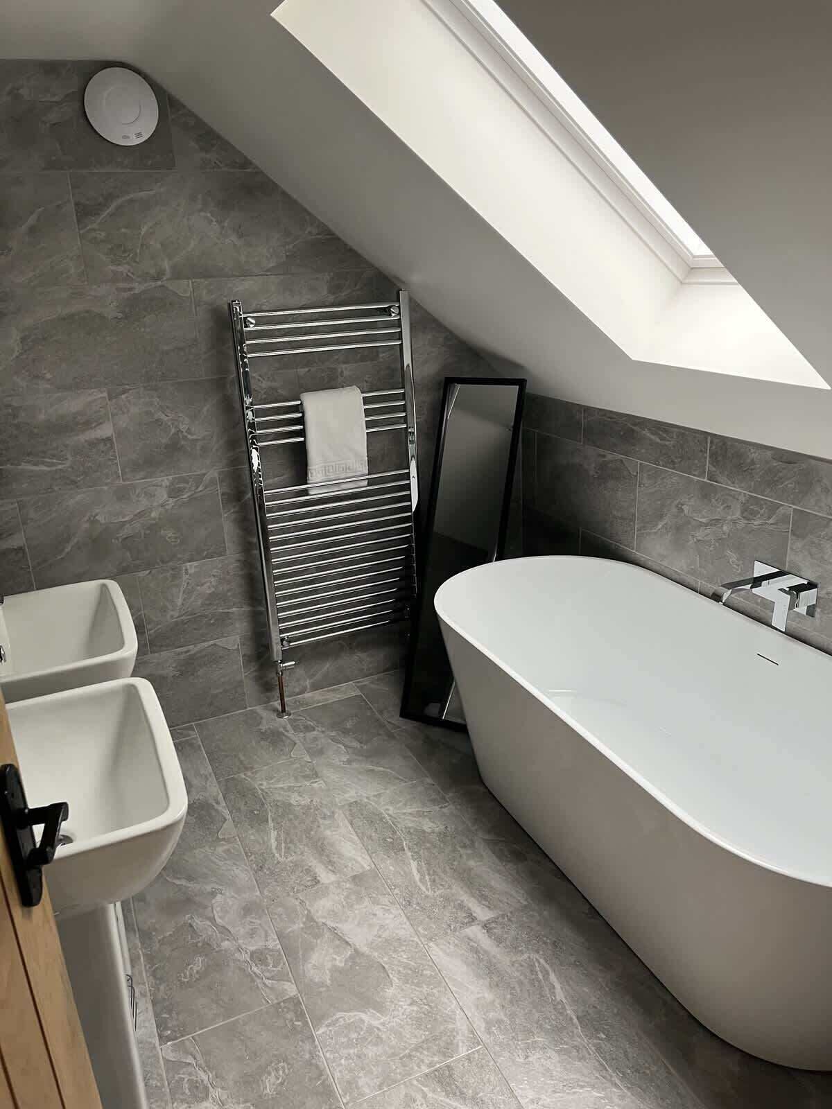 Shower, hair dryer, towels, shampoo
