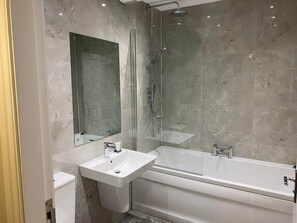 Shower, towels, shampoo