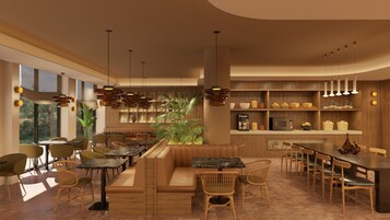 A modern restaurant with a cozy seating area, a buffet counter, and a kitchen visible in the background.