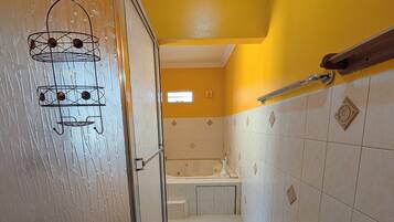 Shower, jetted tub, hair dryer, towels