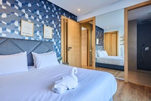 3 habitaciones, tabla de planchar con plancha y cuna de viaje 