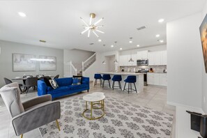 Villa (5 Bedrooms) | Living area | 50-inch Smart TV with cable channels - Family Home With Pool, Mickey & Toy Story Rooms (Davenport)