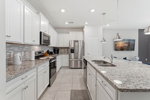 Villa (5 Bedrooms) | Private kitchen | Microwave, oven, stovetop, dishwasher - Family Home With Pool, Mickey & Toy Story Rooms (Davenport)