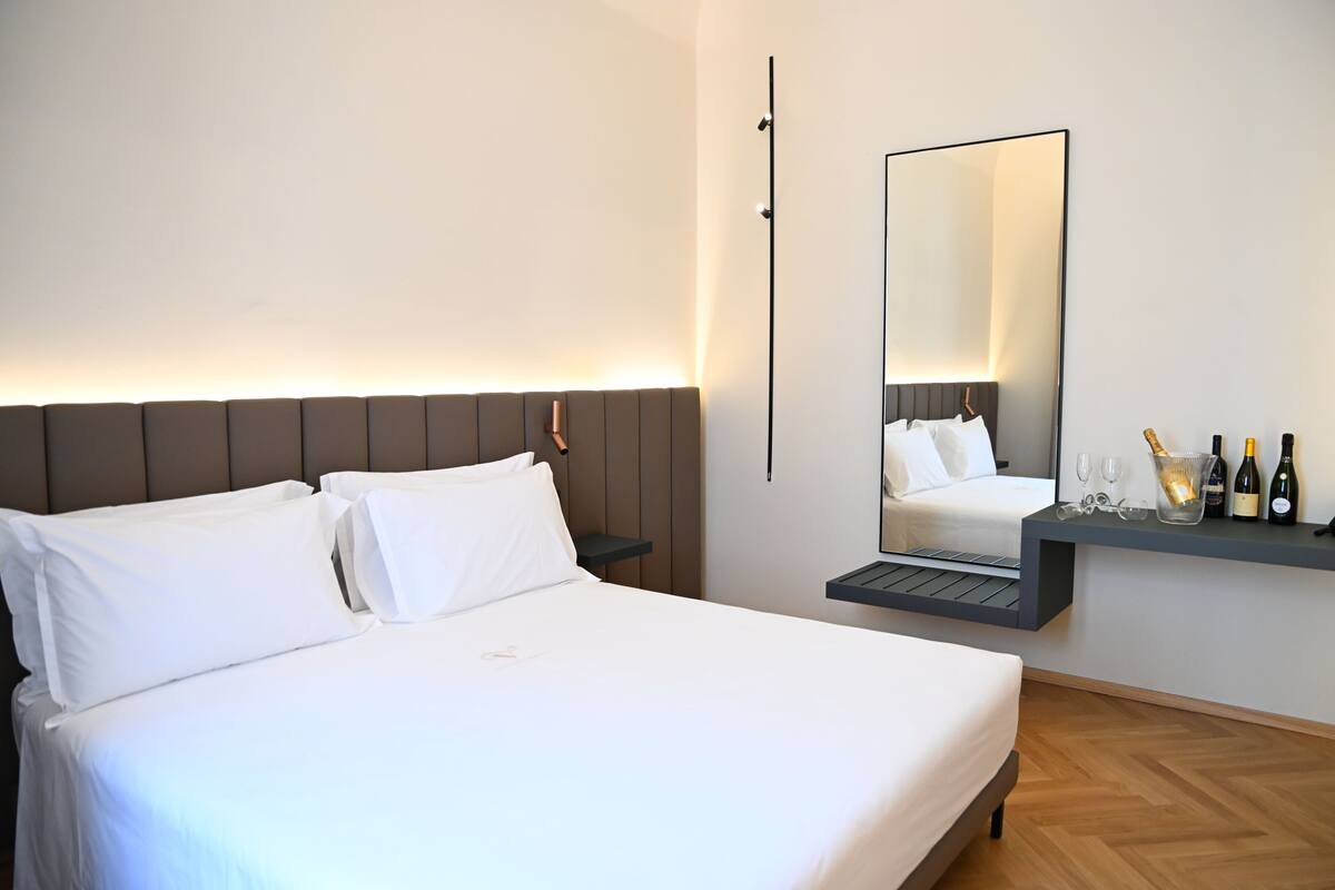 Premium Suite, Balcony, City View | In-room safe, desk, laptop workspace, blackout drapes