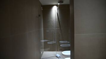 Premium Suite, Balcony, City View | Bathroom | Shower, free toiletries, hair dryer, slippers