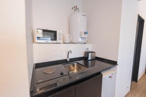 Estúdio, vista para a cidade | Cozinha privada