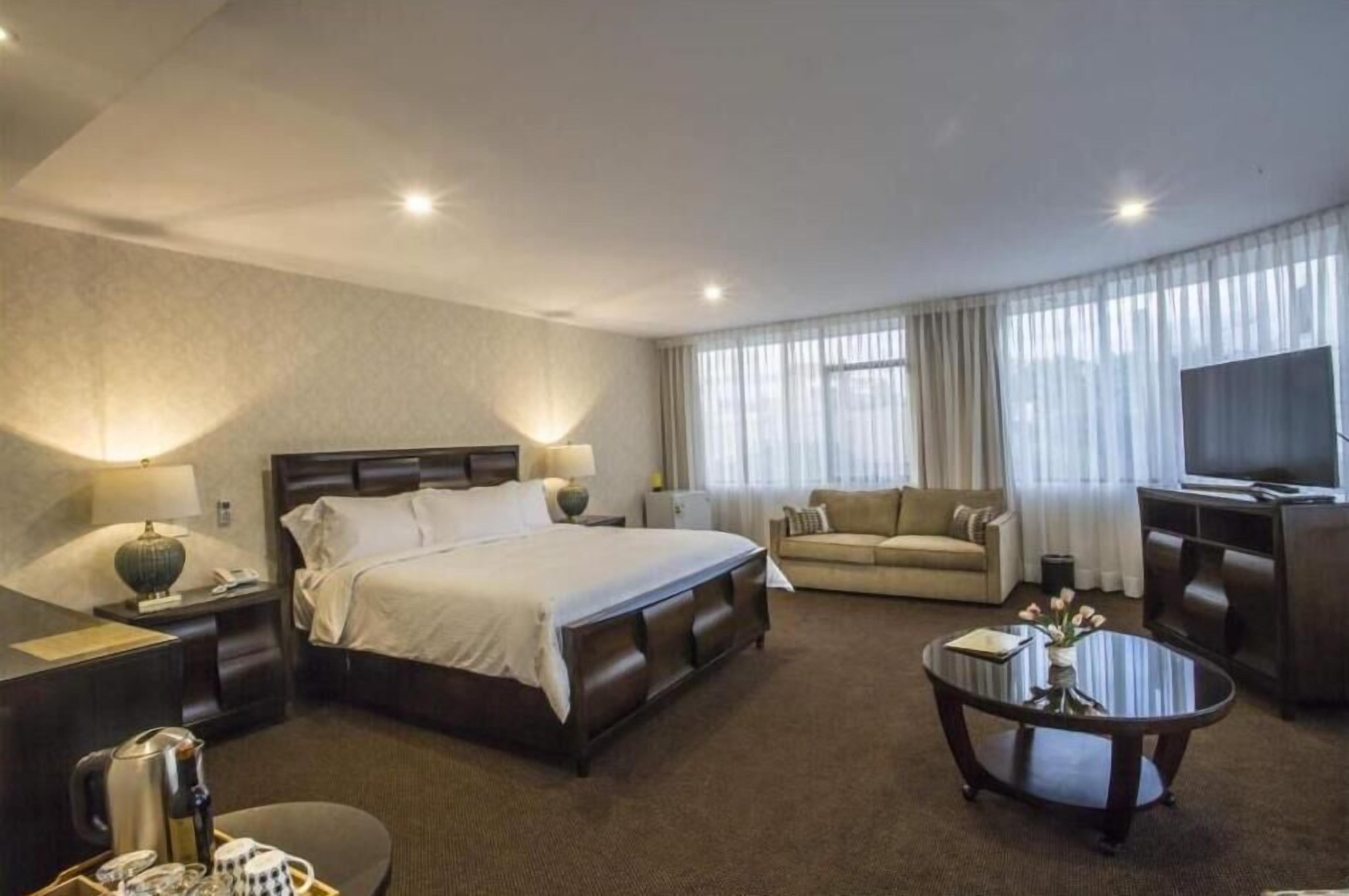 Familien-Doppel- oder -Zweibettzimmer, 1 King-Bett