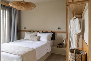 2 chambres, coffre-fort, fer et planche à repasser