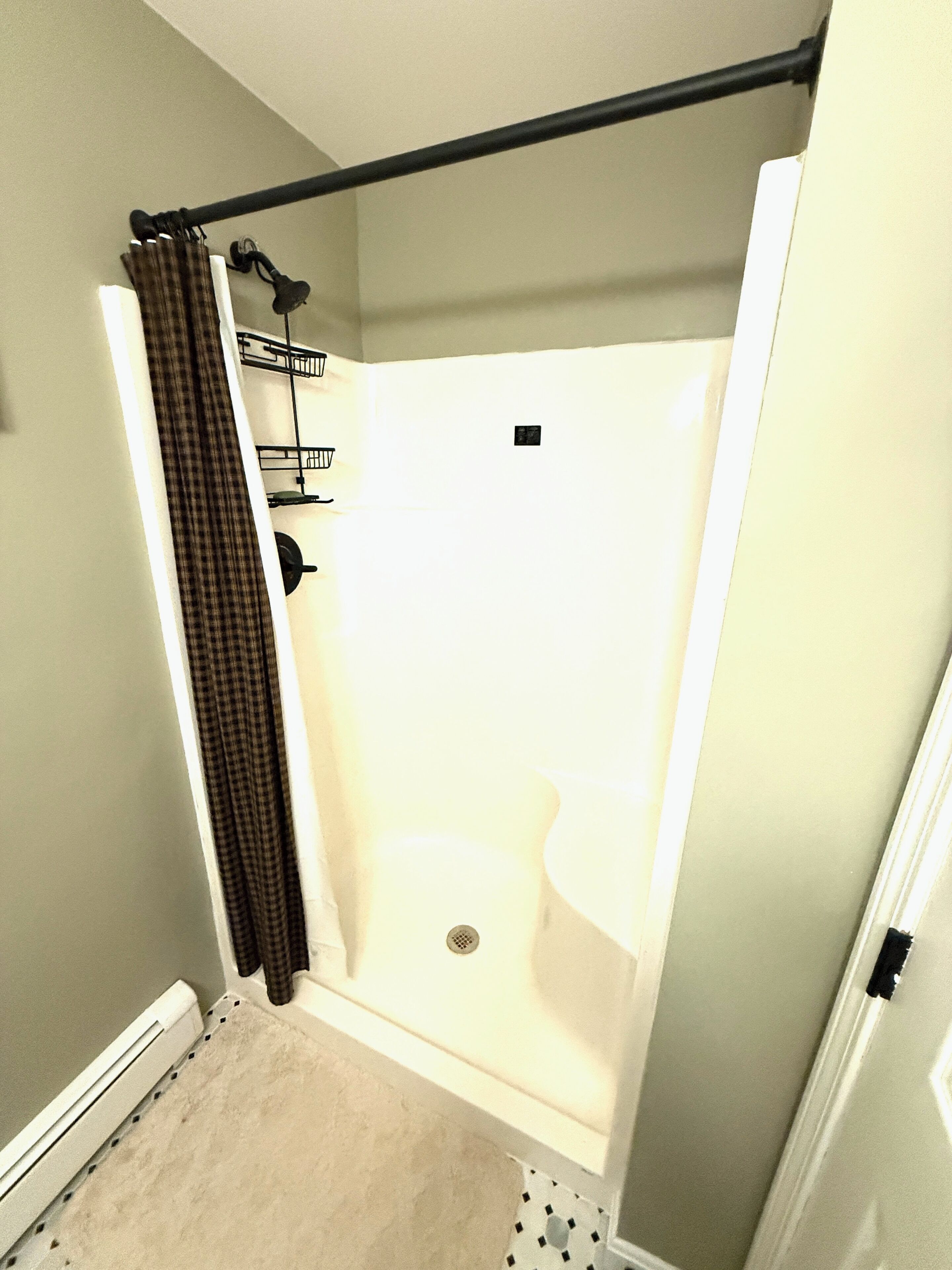 Shower, hair dryer, towels, toilet paper