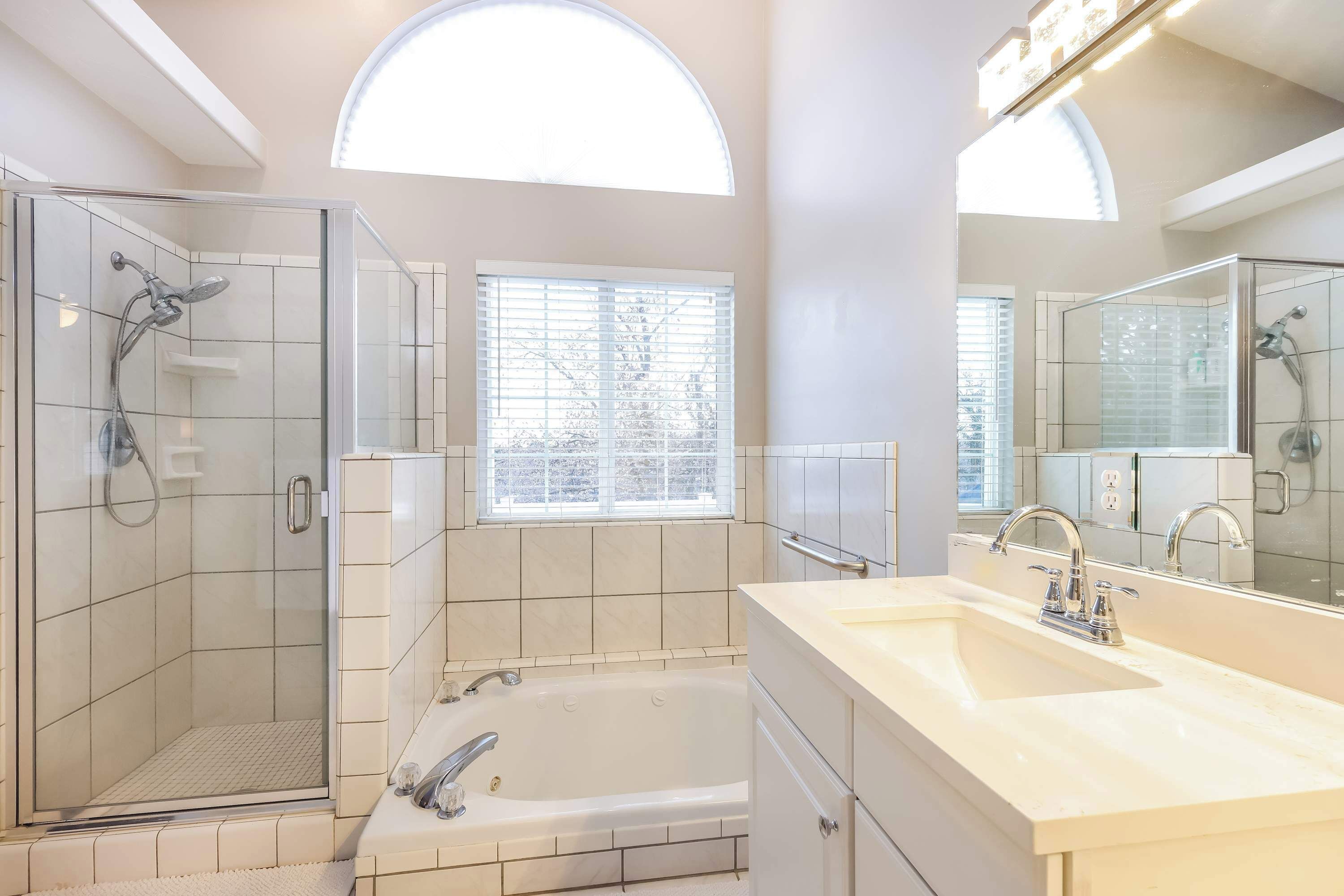 Shower, hair dryer, towels, shampoo