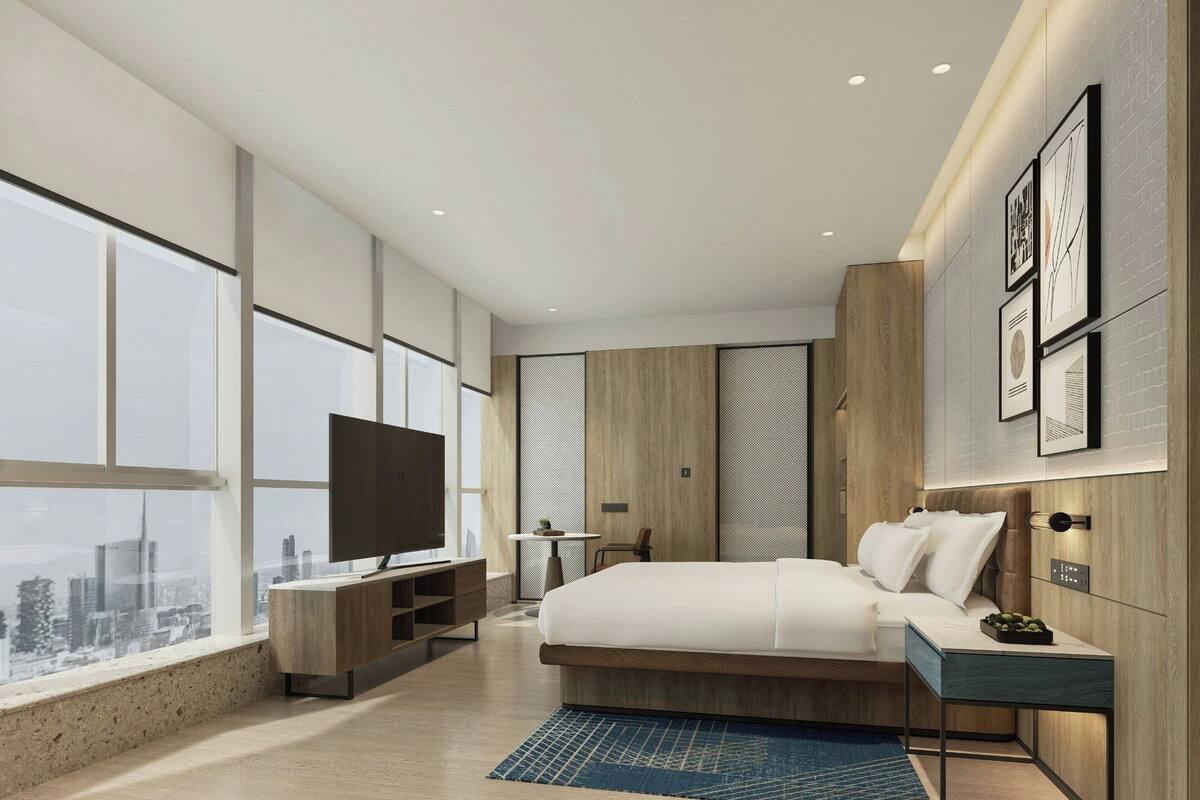 Chambre, 1 très grand lit, vue ville